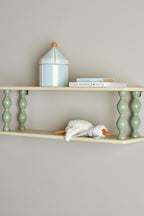 Bibiola Shelf Multi – Bloomingville MINI: wall shelf on the wall with books and a small lamp.
