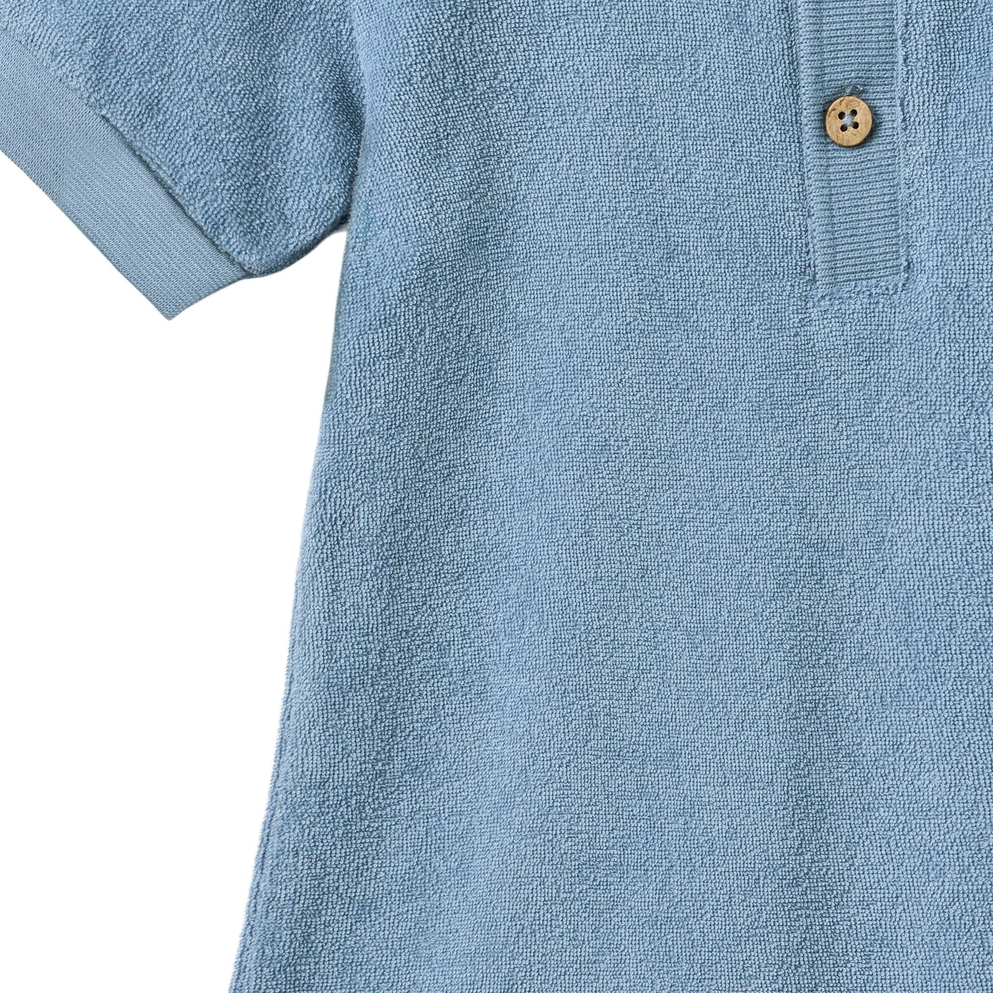 Badstof boxpakje - Playsuit Sully - Biologisch  katoen - Faded Denim/Blauw - Wheat close up